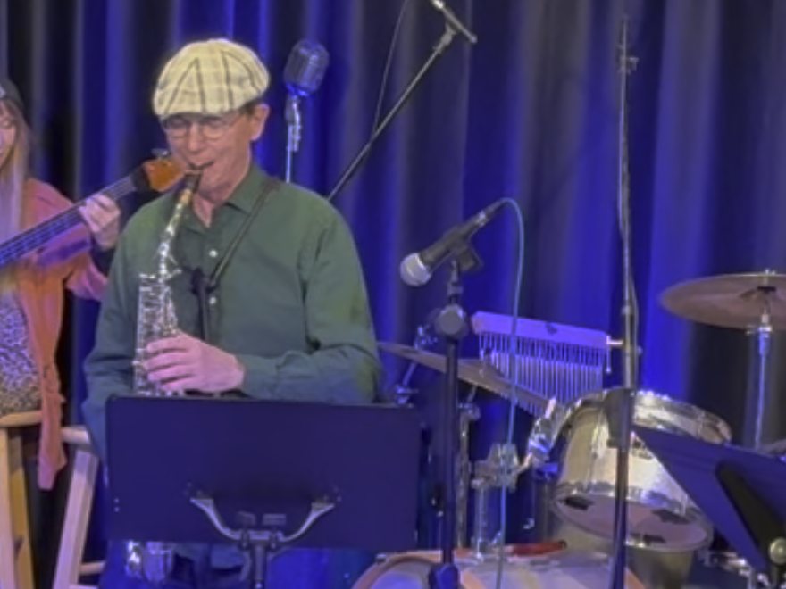 Curt Bergmann soloing on alto saxophone at Showtime Studio and Coffee