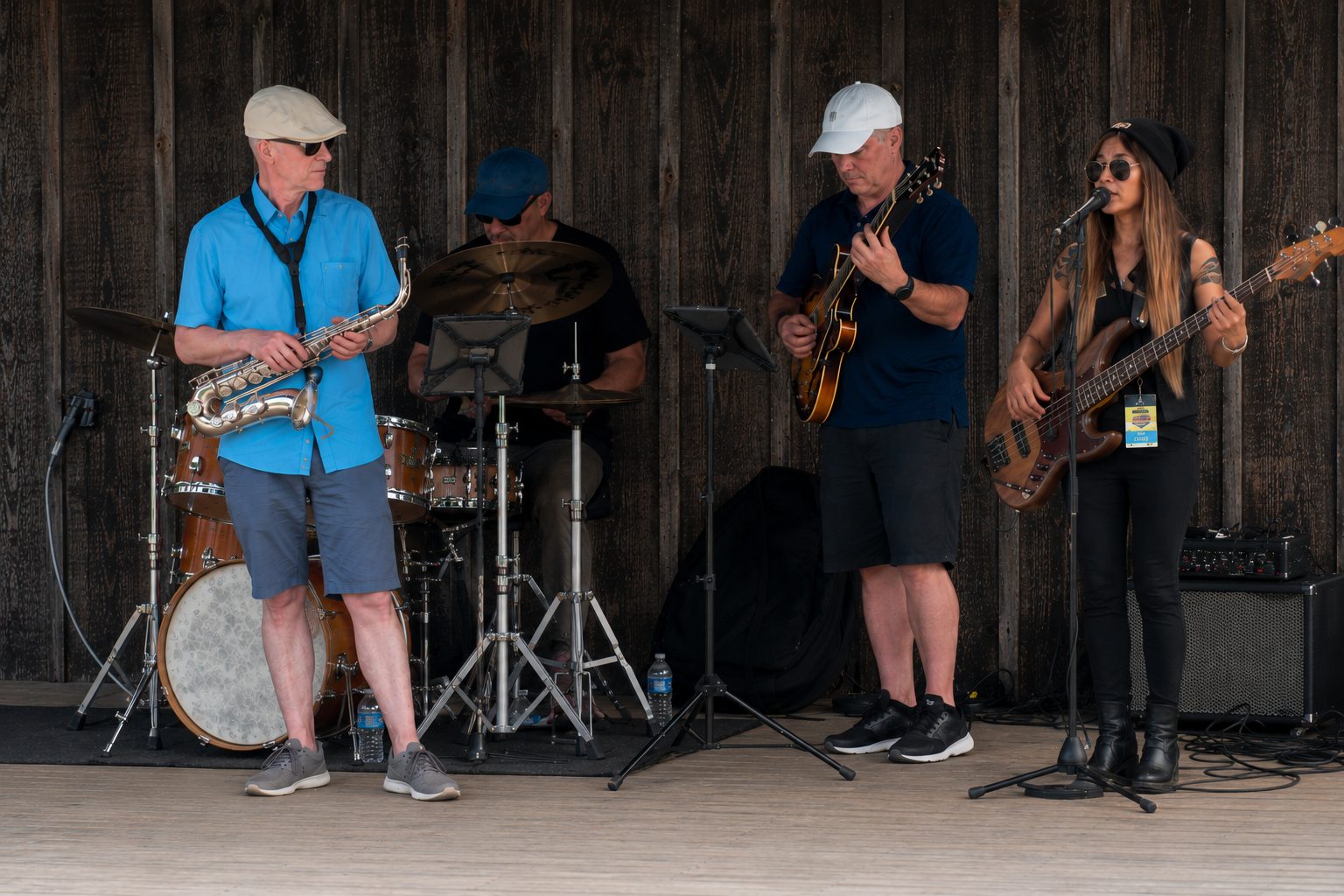 Take Your Time performing on an outdoor stage